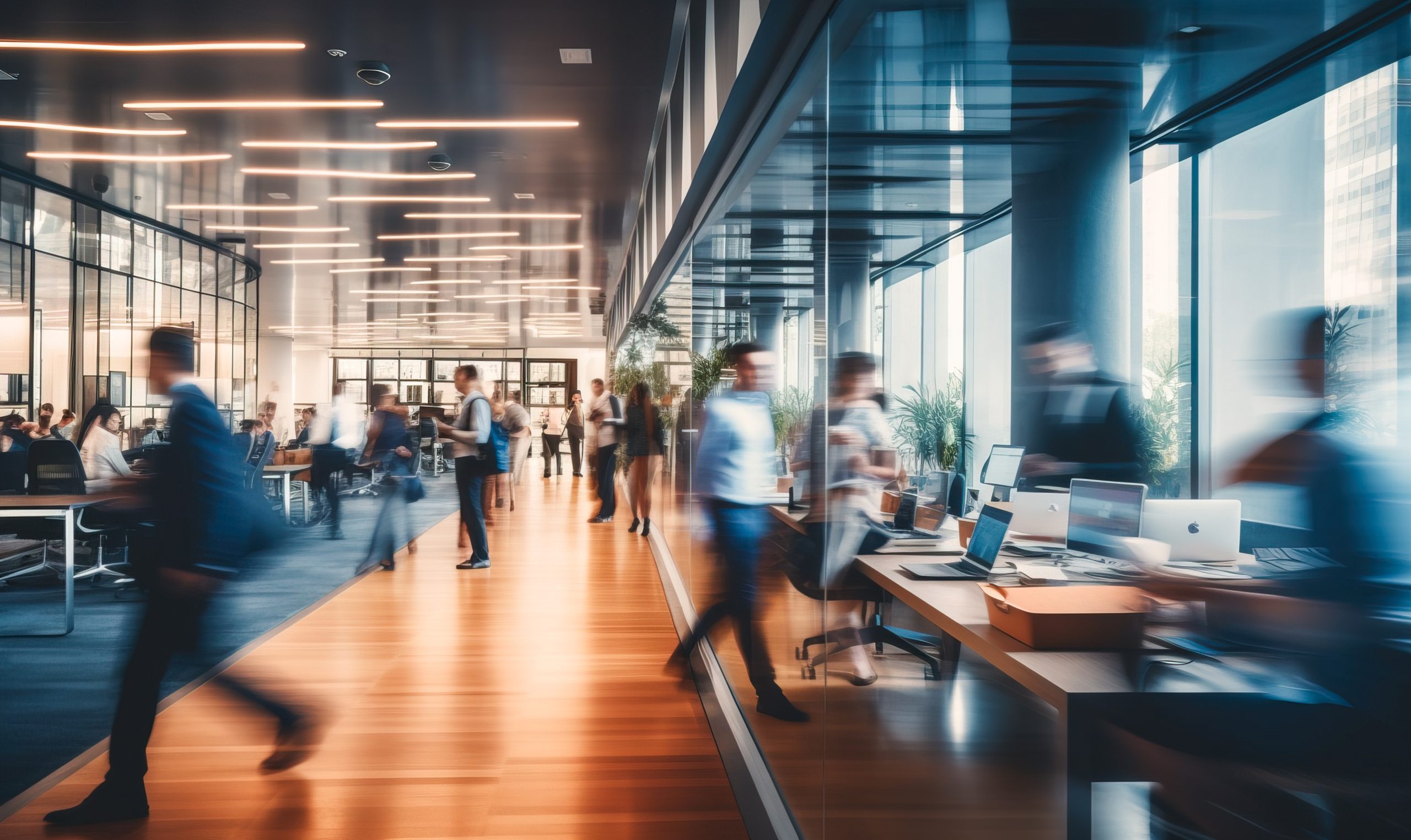 bright business workplace with people in walking in blurred motion in modern office space